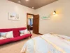 Basement Bedroom #2 has a mermaid theme and a futon couch.