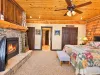 Master Bedroom with a private bathroom and king size bed. Private walk out patio.