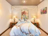 Basement Bedroom #2 is located downstairs with a Queen size bed and a mermaid theme.