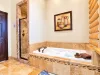 Relax in the bathtub after a beautiful day outdoors.