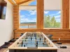 Play a friendly game of foosball with your friends.