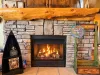 Master bedroom with a propane fireplace.