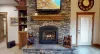 Cozy up by the wood burning fireplace after a long day outdoors.