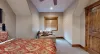 This room is very spacious with seating to relax after a long day.
