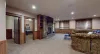 Access the bedrooms and bathroom through the doors here.