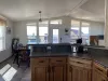 Lots of large windows that illuminate the cabin.