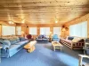 Living room with selection of couches for relaxing.