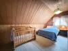 Upstairs bedroom with queen bed. Crib is also available to use.