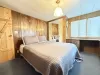 Master bedroom with a queen bed.