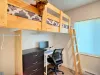 Closet and desk under the twin bed.
