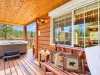 Porch view of sitting area and the hot tub.