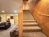 Access the main level and above with the stairs pictured here.
