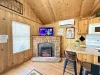 Tv is located in the living room for entertainment.