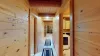 Entryway in the main level to access the laundry room and other bedrooms.