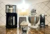 Coffe maker, mixer, toaster and can opener.