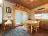 Beautiful open entrance to the cabin to the first dining table with seating for 4.