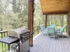 Deck with table for seating.