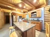 Very open kitchen with appliances, pots and pans, basic cooking essentials, dishes, and utensils.