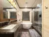 Toilet closet and the deluxe master shared bathroom.