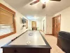 Game room with Air Hockey and Foosball table.