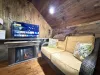 Seating area by the smartTV to relax after a long day.