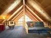 Futon with pull out bed with extra beds.