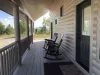 Patio with seating to enjoy the beautiful landscapes of the cabin.