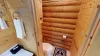 Half bathroom on the main floor with a toilet and sink vanity.