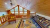 Upstairs loft with a Queen size bed.
