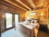 This bedroom is equipped with a King size bed.