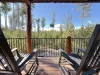 Relax on the back porch and enjoy nature.