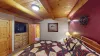 Picture a cozy bedroom in a cabin, where natural materials and soft lighting create a peaceful, retreat-like vibe.