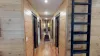 Hallway to access all the different rooms and bathrooms.