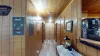 Large hallway to access both bedrooms and the bathroom.