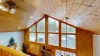Large windows to enjoy the scenic views of the cabin.