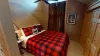 Bedroom #2 located upstairs with a Queen size bed.