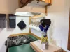 The kitchen may be small but it still has anything you might need.