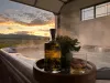 Relax and unwind in the luxury hot tub while taking in the stunning sunset views. The perfect way to end your day.