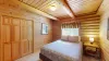 Large window in the room that lets in lots of natural light.