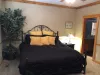 Main level master bedroom with a King size bed.