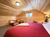King upstairs bedroom with dresser and small closet. Also 2 kids beds. (Bring your own bedding)