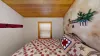 Bedroom #3 located upstairs with a Queen size bed.