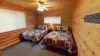Bedroom #2 located upstairs with  2 Queen size bed.