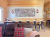 Just behind the main seating area, there’s a functional and stylish island that blends the kitchen and living space effortlessly.