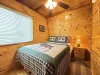 second bedroom with queen bed.
