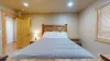 Master bedroom located downstairs.