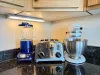 From morning smoothies to baking, top-tier kitchen tools like a KitchenAid mixer and blender are ready for your culinary creations.