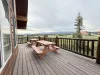 Seating outside on the deck to enjoy the view.