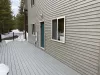 Outdoor deck with the entrance door.