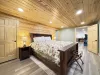 Basement King Bedroom by the game room and bunk room.